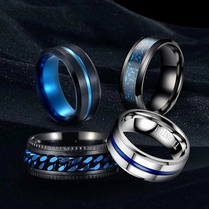Set of four men's titanium steel rings in matte black, polished silver and blue finishes