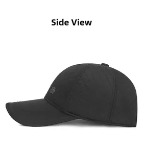 Side view of black quilted baseball cap with warm lining and metal brand plate detail