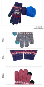 Detail of winter thermal knit gloves with reindeer patterns and warm plush lining