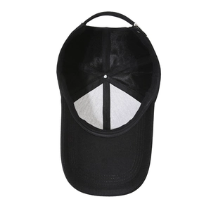 Black cotton baseball cap with long brim, interior view showing sweatband and structure