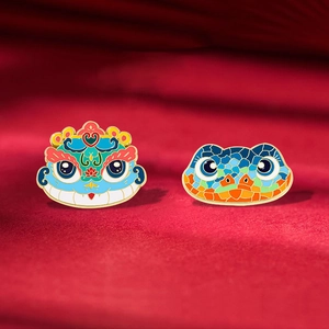 Exquisite 2025 Year of the Snake enamel brooches with lion dance and mosaic snake design