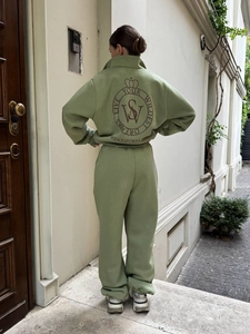 Green athletic tracksuit for women with large back logo print and high waist joggers