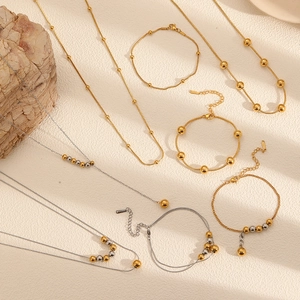 Ensemble collier et bracelet minimaliste en acier inoxydable doré et argenté à billes