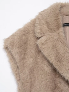 Close-up of the plush faux fur texture and lapel design on this beige fashion vest