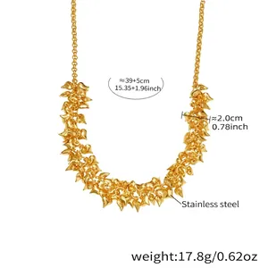 Detailed view of 18k gold plated stainless steel necklace with hollow heart charms
