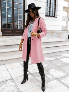 Detail of a pink wool blend long coat with a single button closure and fine texture