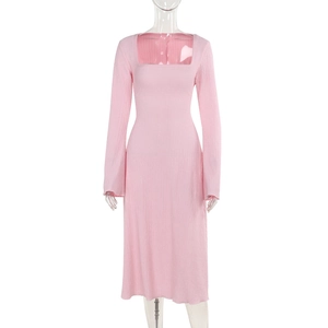 Detailed close-up of pink square neck long-sleeve dress with fine pleated ribbed texture