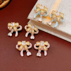 Elegant bow knot earrings with colorful enamel and sparkling cubic zirconia stones