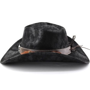 Detail of metal rivets and cord knot on black western cowboy hat with wide brim