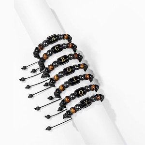 Handmade 10mm lava stone and tiger eye beaded bracelet with gold initial letter charm
