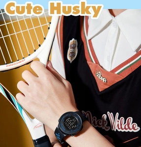 Close-up of a digital sports watch with black silicone strap and blue lightning patterns