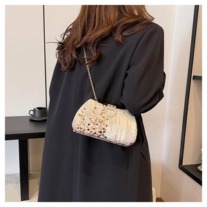 Detailed close-up of rose gold sequin evening bag with rhinestone buckle and chain