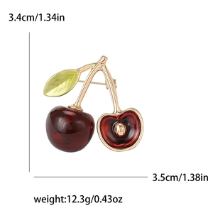 Cute red enamel cherry brooch in gold alloy finish with dimensions and weight labels