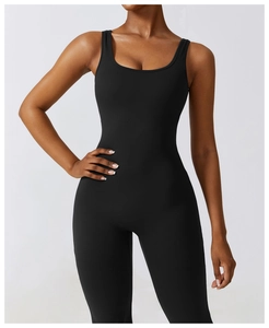 Close-up of black high-waisted yoga bodysuit with wide straps and deep U-neckline