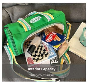 Top view of green cylindrical dance bag showing spacious interior with notebooks and snacks
