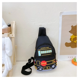 Detail of cute black school bus shape kids chest bag with adjustable nylon straps
