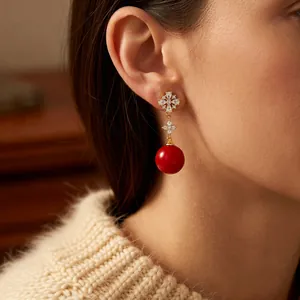 Elegant 18K gold plated earrings with a red round pendant and sparkling zircon accents