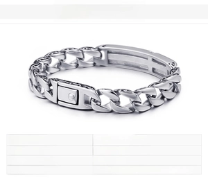 Detail of silver stainless steel Cuban link bracelet with cross relief and square clasp