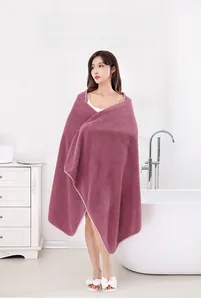 Detail of dark purple 3D waffle weave bath towel with highly absorbent honeycomb texture