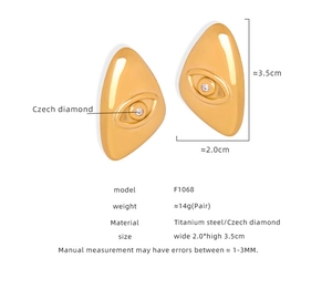 Detailed view of evil eye earrings in titanium steel with measurements 3.5cm by 2.0cm