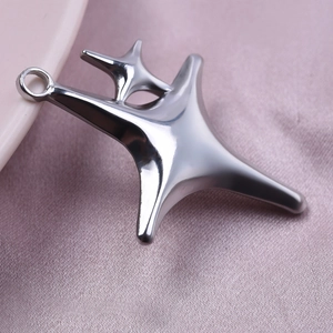 Macro shot of a silver star pendant made of 304 stainless steel with a high-shine finish