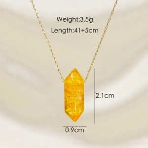 Detail of yellow crystal hexagonal prism pendant with 41+5cm gold chain measurements