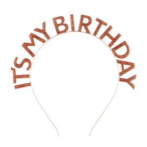 Macro detail of rose gold glitter It's My Birthday headband lettering for party crown