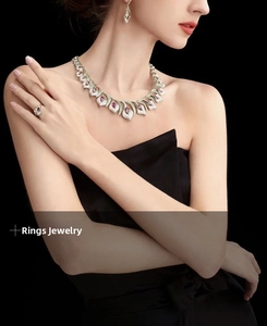 Detailed view of elegant silver leaf jewelry set with purple amethyst-like marquise stones