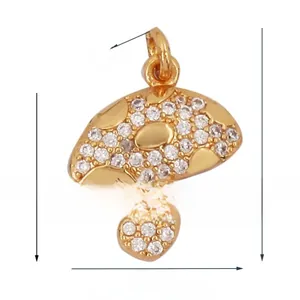 Macro detail of mushroom pendant with white zircon pavé and gold plated finish dimensions