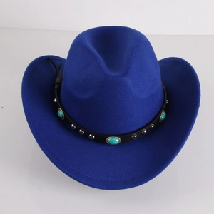 Close-up of royal blue wool cowboy hat with leather belt and turquoise metal studs