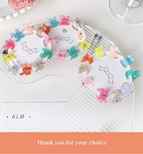 Set of ten colorful butterfly mini hair clips in macaron colors on display card