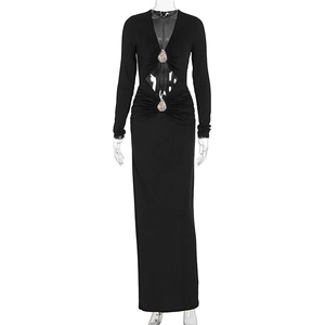 Detail of elegant black long sleeve dress with cut-outs and rhinestone water-drop buckles