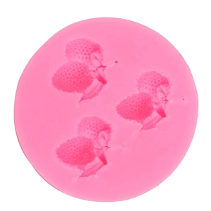Pink silicone mold featuring three strawberry shapes for fondant and chocolate baking
