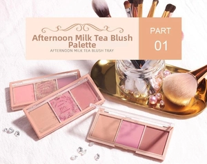 Detailed view of the three-color blush palette on a stylish textured background