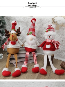 Detailed view of Christmas plush dolls with long legs featuring deer and snowman designs