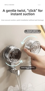 Close-up of hand rotating a vacuum suction hook for tool-free installation