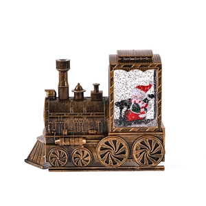 Vintage bronze Christmas train snow globe with built-in LED light and snowman scene