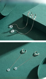 Détail du clip d'oreille chaîne longue en argent s925 avec pendentif rond élégant