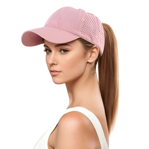 Pink quick-dry ponytail baseball cap featuring laser-cut breathable holes and rear opening
