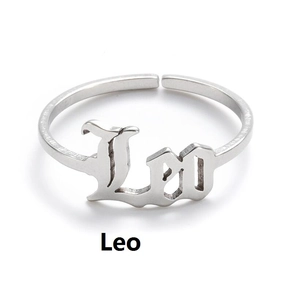 Detailed top view of a silver Leo zodiac ring made of polished stainless steel