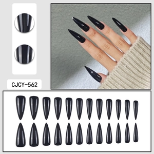 Glossy black stiletto press-on nails set with 24 pieces for minimalist dark aesthetic style