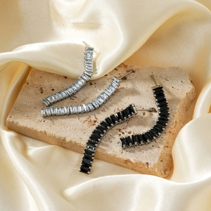 Exquisite silver-toned curved earrings with rectangular zircon studs and tassels