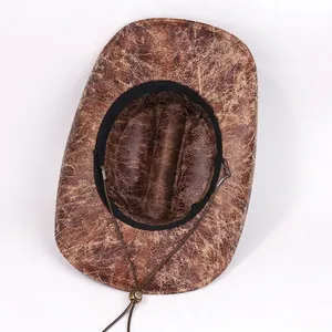 Vintage brown western cowboy hat with suede texture and adjustable chin strap