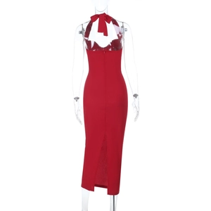 Rear view of red backless halter dress showing invisible zipper and bottom hem slit