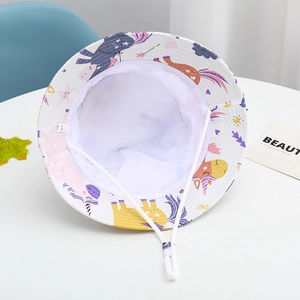 Detail of kids white sun hat with unicorn prints, windproof cord and size 52 label