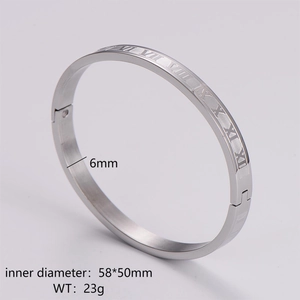 Detail of 6mm silver stainless steel bangle with engraved Roman numerals and dimensions