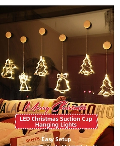 Warm yellow LED Christmas window hanging light with suction cup and festive holiday motifs