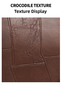 Close-up of brown crocodile texture and precise stitching on large tote bag