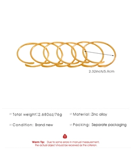 Detail showing zinc alloy gold bangle set with 5.9cm diameter and 76g total weight