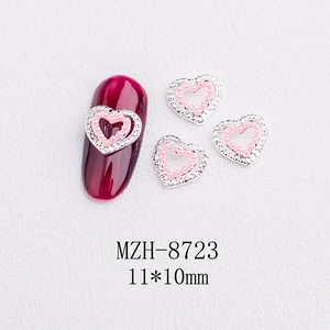 Detail of 3D double heart nail charm with pink pearl and rhinestones size 11x10mm